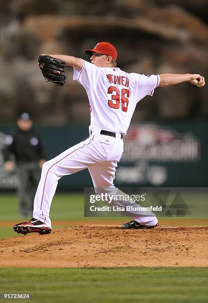 Starting pitcher Jered Weaver of the Los Angeles Angels of Anaheim delivers a pitch against the Boston Red Sox during Game Two of the ALDS during the...