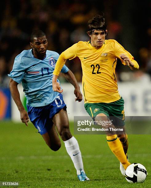 Dario Vidosic of Australia competes with Ryan Babel of the Netherlands during the international friendly match between Australia and the Netherlands...