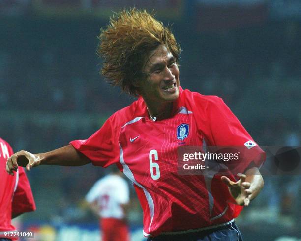 South Korea's Yoo Sang Chul celebrates after scoring against Poland in the 53rd minute, 04 June 2002 at the Busan Asiad Main Stadium in Busan, during...
