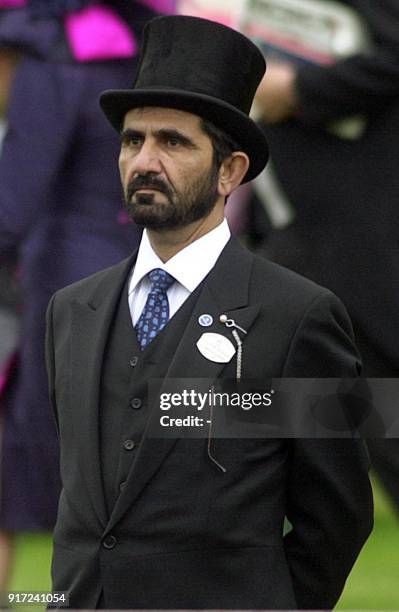 Sheikh Mohammed watches as his horse Kayf Tara parade prior to the start the Gold Cup race at Royal Ascot's Ladies Day 22 June before winning the...