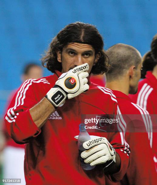 Turkish goalkeeper Rustu Recber drinks water 02 June 2002 during a training session at the Munsu Stadiun in Ulsan. Turkey will play Brazil 03 June...
