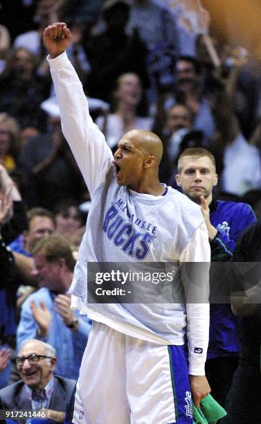 Scott Williams of the Milwaukee Bucks leads the cheer during his game against the Philadelphia 76ers in the NBA Eastern Conference final game six 01...