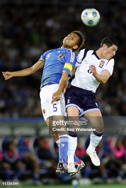 Junichi Inamoto of Japan and Graham Dorrans of Scotland compete for the ball during Kirin Challenge Cup 2009 match between Japan and Scotland at...