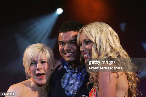 Singer Guy Sebastian poses for photos with fans during the Australian Commercial Radio Awards 2009 at the Sydney Convention & Exhibition Centre on...