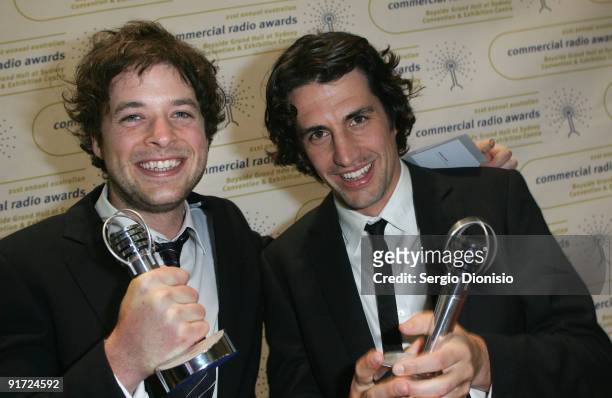 Radio and television personalities Hamish Blake and Andy Lee celebrate after winning the 'Best On-Air Team' award at the Australian Commercial Radio...
