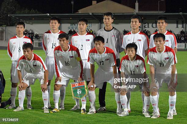 Players of the North Korean national football team pose prior to the start of the friendly football match FC Nantes vs. North Korea's national...