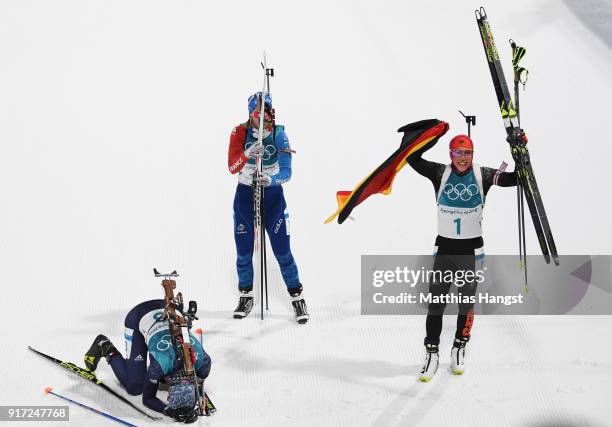 Laura Dahlmeier of Germany, Anastasiya Kuzmina of Slovakia and Anais Bescond of France react after crossing the finish line during the Women's...