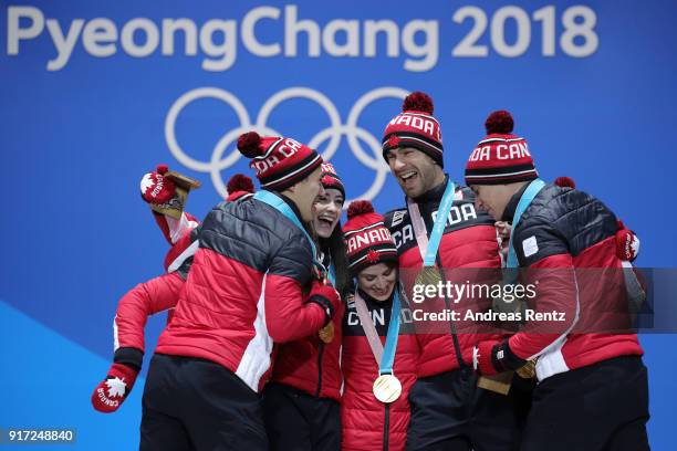 Gold medalists Team Canada celebrate during the medal ceremony after the Figure Skating Team Event at Medal Plaza on February 12, 2018 in...