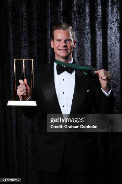 Steve Smith poses with the Allan Border Medal and the award for Test Player of the Year during the 2018 Allan Border Medal at Crown Palladium on...