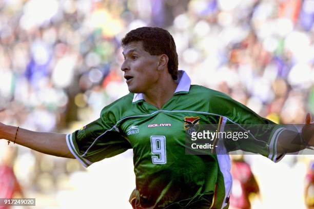 Joaquin Botero celebrates after scoring his team's second goal against Venezuela, during their 03 June qualification match in La Paz for the 2002...