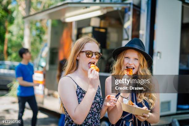dieting with greasy but tasty junk food - food festival stock pictures, royalty-free photos & images