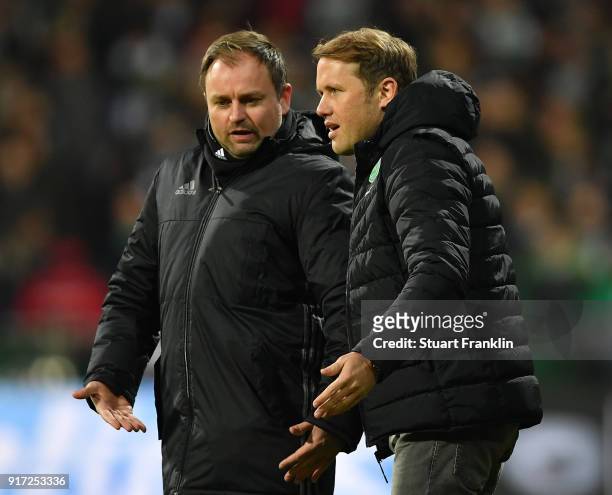 Olaf Rebbe, sports director of Wolfsburg gestures to the fourth official during the Bundesliga match between SV Werder Bremen and VfL Wolfsburg at...