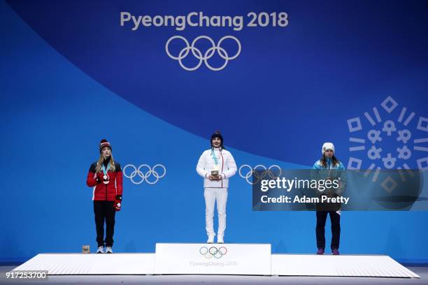 Silver medalist Justine Dufour-Lapointe of Canada, gold medalist Perrine Laffont of France and bronze medalist Yulia Galysheva of Kazakhstan pose...