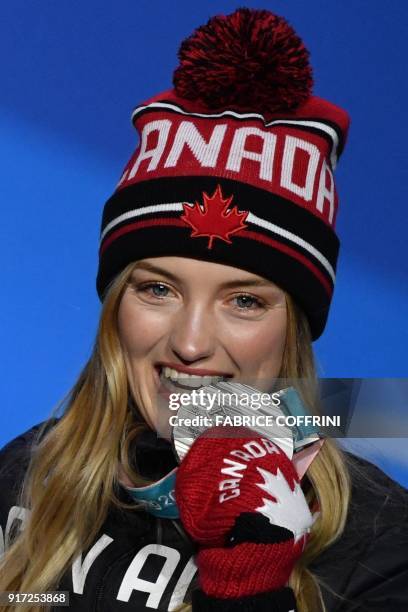 Canada's silver medallist Justine Dufour-Lapointe poses on the podium during the medal ceremony for the women's freestyle skiing moguls at the...