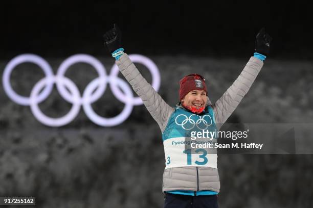 Silver medalist Anastasiya Kuzmina of Slovakia celebrates during the victory ceremony after the Women's Biathlon 10km Pursuit on day three of the...