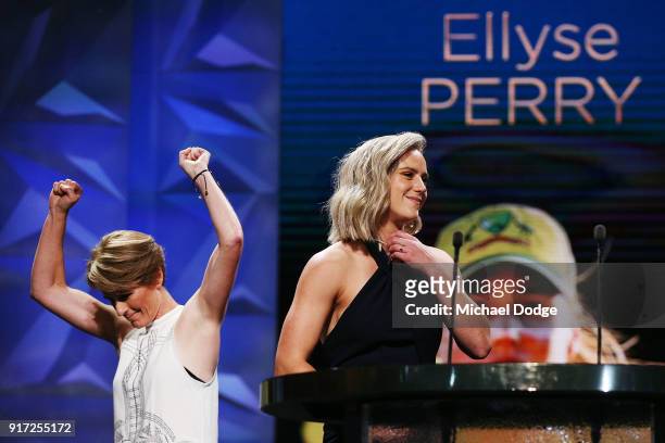 Ellyse Perry receives the Belinda Clark Award from Belinda Clark who raises her arms afer finally getting the necklace around her neck at the 2018...