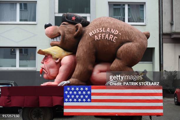 Carnival float, depicting a bear with the writing "Russia affair" on US President Donald Trump, is pictured during a carnival parade on Rose Monday...