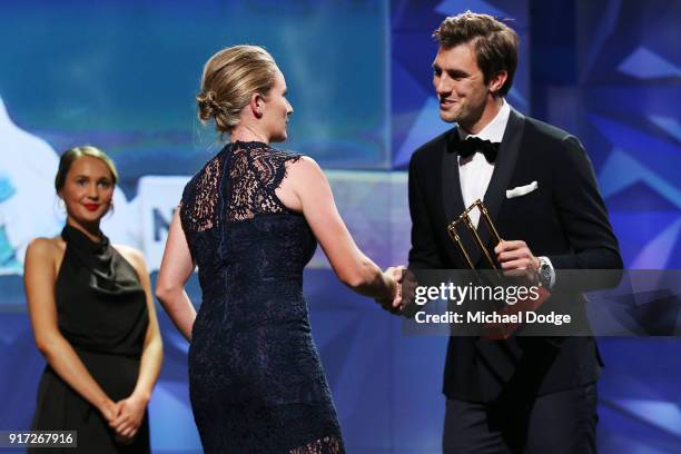 Beth Mooney speaks accepts her award from Pat Cummins at the 2018 Allan Border Medal at Crown Palladium on February 12, 2018 in Melbourne, Australia.