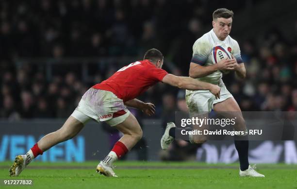 George Ford of England moves past Gareth Davies during the NatWest Six Nations match between England and Wales at Twickenham Stadium on February 10,...