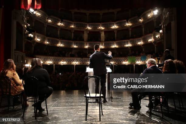 Leader of the anti-establishment Five Star Movement , Luigi Di Maio gestures as he delivers a speech during a rally at the Sannazzaro Theatre in...