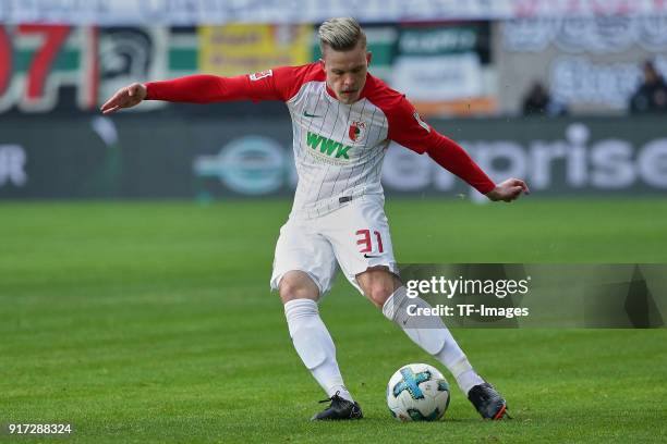 Philipp Max of Augsburg controls the ball during the Bundesliga match between FC Augsburg and Eintracht Frankfurt at WWK-Arena on February 4, 2018 in...