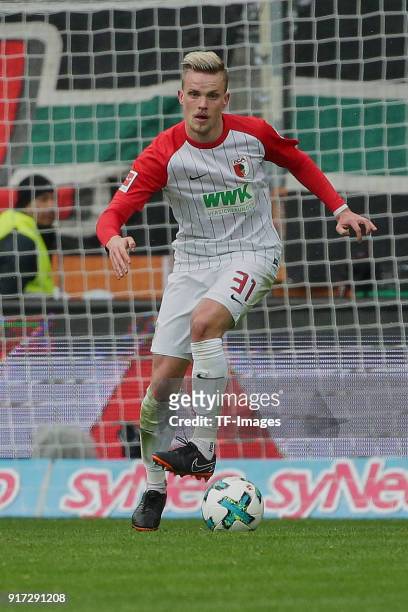Philipp Max of Augsburg controls the ball during the Bundesliga match between FC Augsburg and Eintracht Frankfurt at WWK-Arena on February 4, 2018 in...