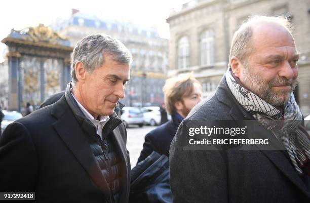 French former budget minister Jerome Cahuzac , flanked by his lawyer Eric Dupond-Moretti arrives at the Paris courthouse for his appeal trial on tax...