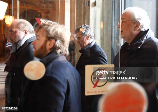 French former budget minister Jerome Cahuzac , flanked by his lawyers Eric Dupond-Moretti and Jean-Alain Michel , arrives at the Paris courthouse for...