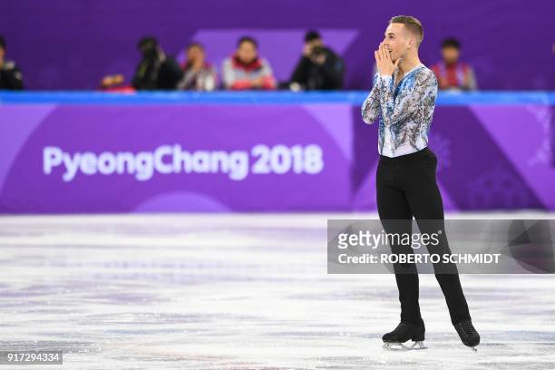 S Adam Rippon reacts after finishing his routine in the figure skating team event men's single skating free skating during the Pyeongchang 2018...