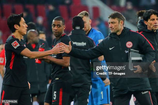 Makoto Hasebe of Frankfurt, Gelson Fernandes of Frankfurt and Assistant coach Robert Kovac of Frankfurt look dejected after the Bundesliga match...