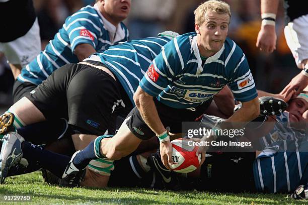 Sarel Pretorius off loads the ball during the Absa Currie Cup match between GWK Griquas and Sharks from GWK Park on 10 October 2009 in Kimberley,...