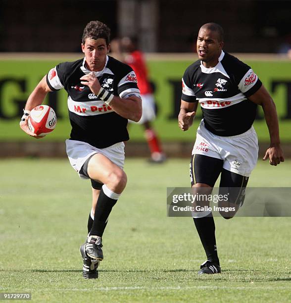 Ruan Pienaar and JP Pietersen in action during the Absa Currie Cup match between GWK Griquas and Sharks from GWK Park on 10 October 2009 in...