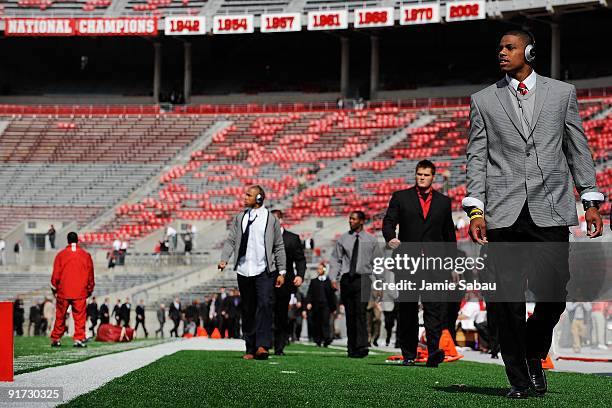 Quarterback Terrelle Pryor of the Ohio State Buckeyes leads the team across the field to the lockerroom before a game against the Wisconsin Badgers...
