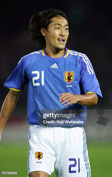 Naohiro Ishikawa of Japan looks on during the Kirin Challenge Cup 2009 match between Japan and Scotland at Nissan Stadium on October 10, 2009 in...