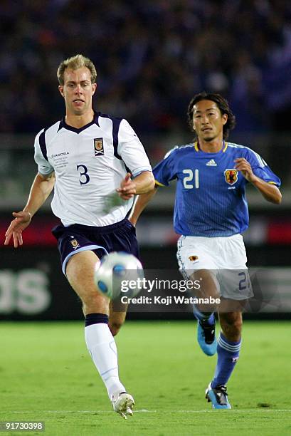 Steven Whittaker of Scotland and Naohiro Ishikawa of Japan compete for the ball during Kirin Challenge Cup 2009 match between Japan and Scotland at...