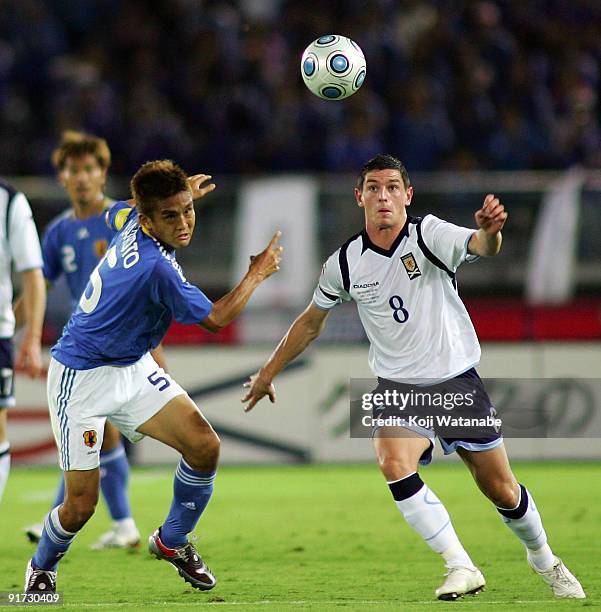 Graham Dorrans of Scotland and Junichi Inamoto of Japan compete for the ball during Kirin Challenge Cup 2009 match between Japan and Scotland at...