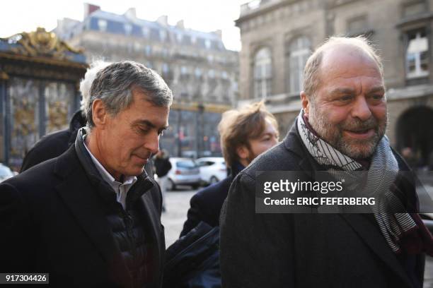 French former budget minister Jerome Cahuzac , flanked by his lawyer Eric Dupond-Moretti arrives at the Paris courthouse for his appeal trial on tax...