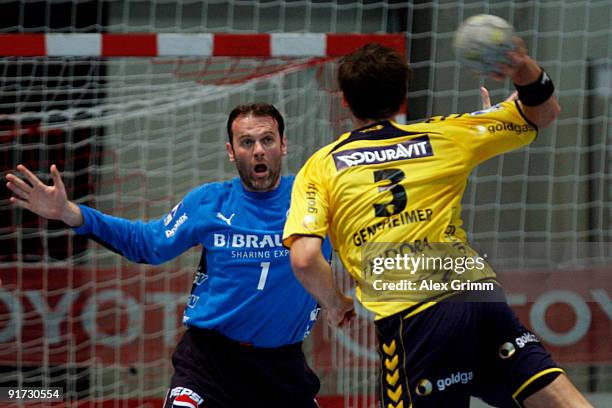 Uwe Gensheimer of Rhein-Neckar Loewen scores a goal against goalkeeper Mario Kelentric of Melsungen during the Toyota Handball Bundesliga match...