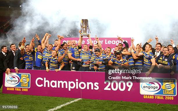 Kevin Sinfield of Leeds Rhinos lifts the trophy with team mates during the Engage Super League Grand Final between Leeds Rhinos and St Helens at Old...