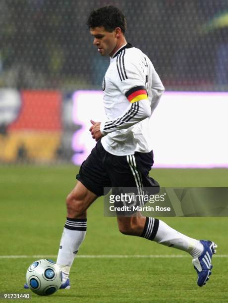 Michael Ballack of Germany runs with the ball during the FIFA 2010 World Cup Group 4 Qualifier match between Russia and Germany at the Luzhniki...