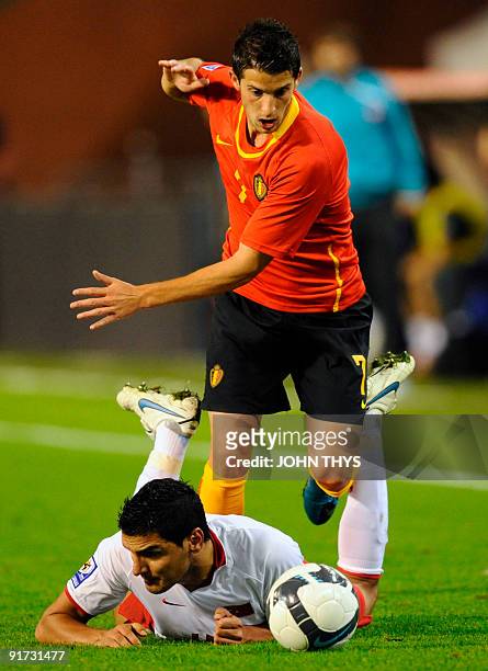 Belgian's Kevin Mirallas vies for the ball with Turkey's Onder Turaci during their World Cup 2010 qualifying football match in Brussels on October...