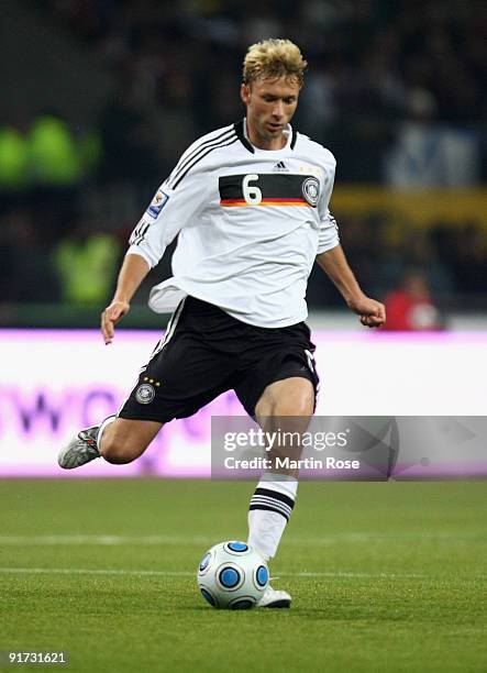 Simon Rolfes of Germany runs with the ball during the FIFA 2010 World Cup Group 4 Qualifier match between Russia and Germany at the Luzhniki Stadium...