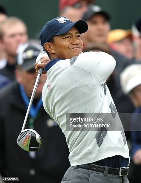 Team member Tiger Woods hits on the 17th tee, during the third round - foursome matches at the Presidents Cup golf competition on October 10 at...
