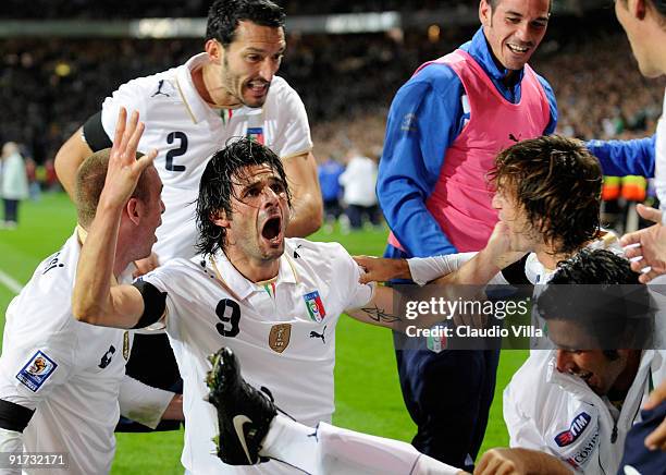 Vincenzo Iaquinta of Italy celebrates with teammates during the FIFA 2010 World Cup Group 4 Qualifying match between Republic of Ireland and Italy at...