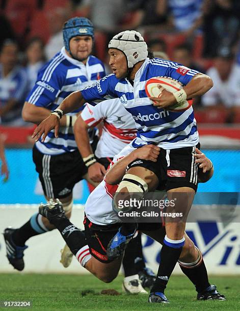 Gio Aplon of Western Province tackled during the Absa Currie Cup match between Xerox Lions and Western Province from Coca-Cola Park on October 10,...