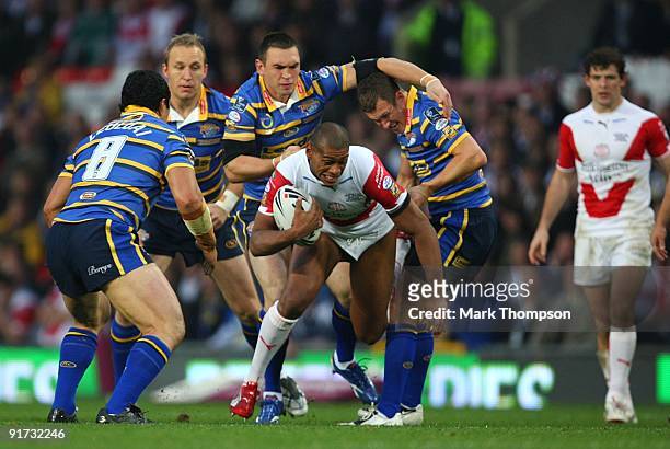 Leon Pryce of St Helens is held up by the Leeds defence during the Engage Super League Grand Final between Leeds Rhinos and St Helens at Old Trafford...