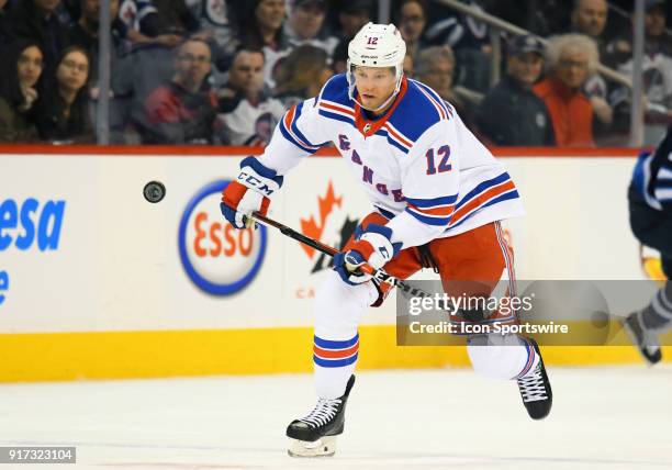 New York Rangers Center Peter Holland skates up ice during a NHL game between the Winnipeg Jets and New York Rangers on February 11, 2018 at Bell MTS...