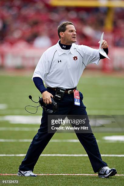 Head Coach Gene Chizik of the Auburn Tigers yells at the referees during a game against the Arkansas Razorbacks at Donald W. Reynolds Stadium on...