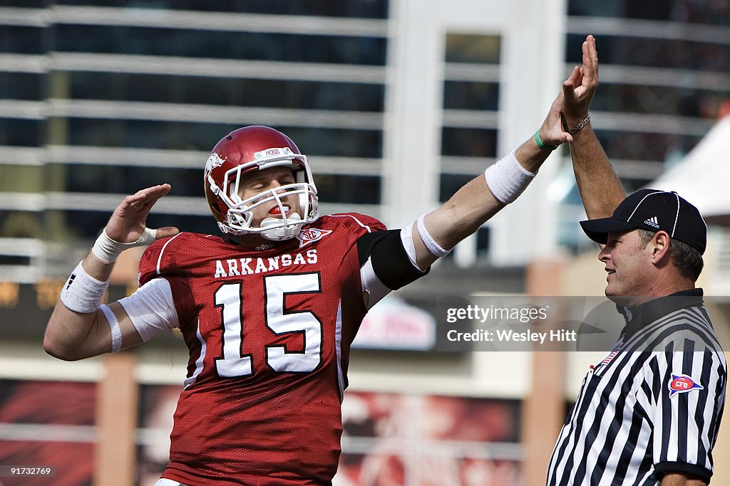 Arkansas Razorbacks High Kick Ryan Mallett of the Arkansas Razorbacks high fives the Referee during ...