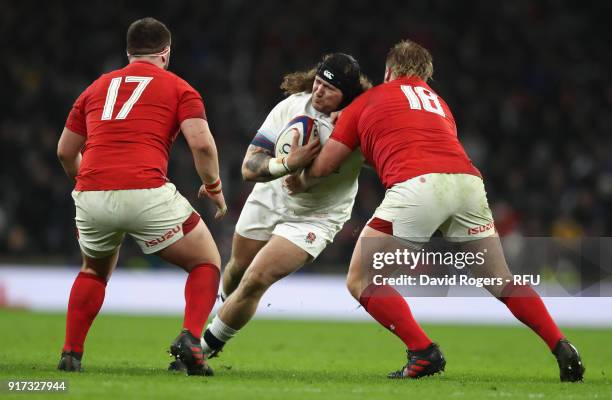 Harry Willaims of England is tackled by Bradley Davies during the NatWest Six Nations match between England and Wales at Twickenham Stadium on...